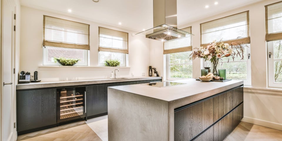 luxury kitchen remodel in austin texas with warm, modern design and kitchen island