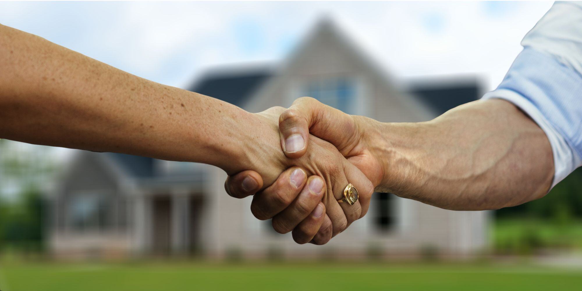 Two People Shaking Hands