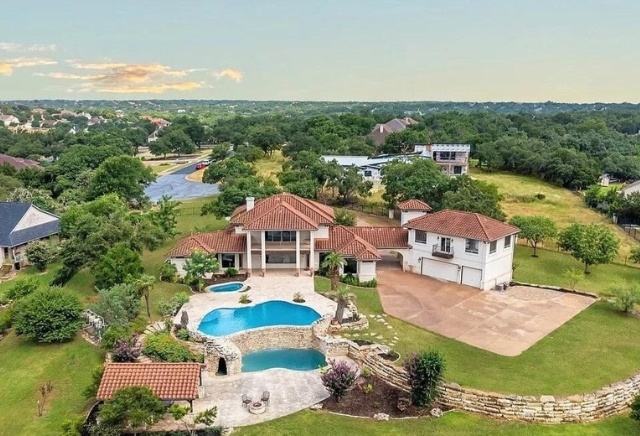 exterior-custom-home-backyard-multiple-pools-austin-texas-1